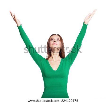girl arms up, looking upwards like holding something above, full length standing isolated on white background.