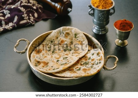 Similar – Image, Stock Photo Indian flatbreads on a blue background, above view. Homemade naan bread