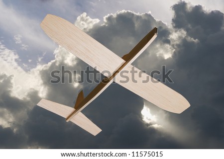 Soar, a model plane with a dramatic sky