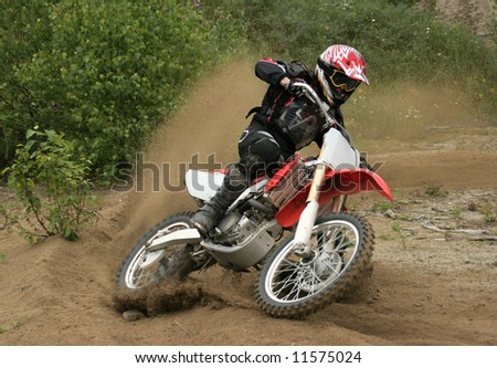 Apex, a motocross rider powering out of a turn