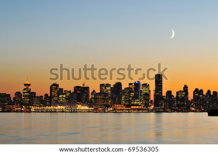 downtown vancouver night scene with crescent moon