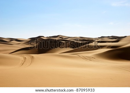 Desert in Hasi Labied, Moroco, Africa. Interesting colored sand dunes. Popular travel destination.