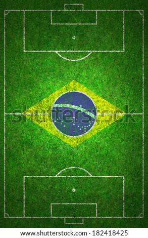 Football pitch with Brazil flag.