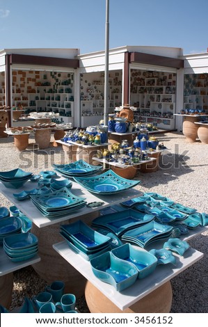 plates and bowls in ceramic shop in greece