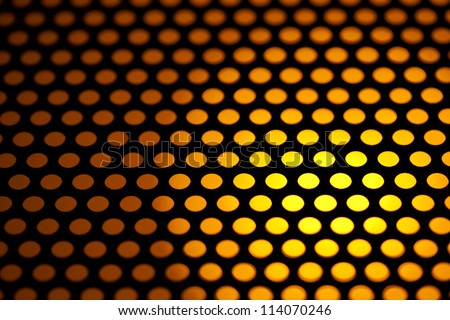 abstract background of metal mesh with orange back lighting