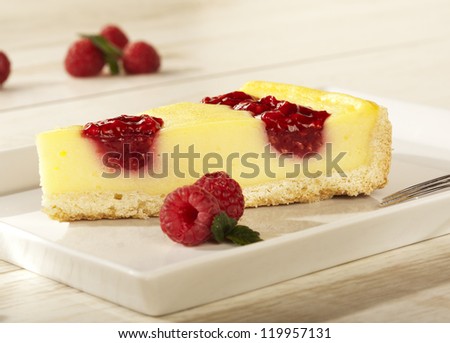 Single piece of raspberry cheesecake, selective focus