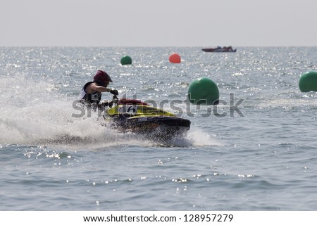 CHONBURI, THAILAND-DECEMBER 8: Unidentified Jet Ski driver in action during Jet Ski King\'s Cup - World Cup Grand Prix 2012 at Jomtien Beach Pattaya on December 8, 2012 in Chonburi, Thailand