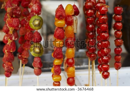 Grilled fruits. Chinese fastfood in the center of Beijing.