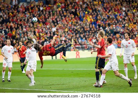 MADRID - MAR 28: Spain's Sergio Ramos bicycle kick shot goes just wide during the second half of their 1-0 victory over Turkey in their World Cup Qualifier March 28, 2009 in Madrid, Spain.