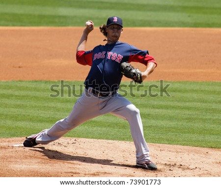 JUPITER, FL USA - MAR. 24: Red Sox starting pitcher Clay Buchholz pitches during the Boston Red Sox vs. Florida Marlins spring training game on March 24, 2010 in Jupiter, FL.