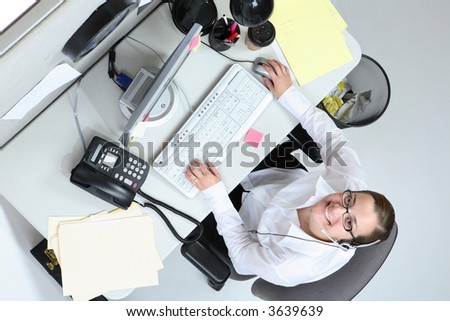 Overhead view of woman at office desk