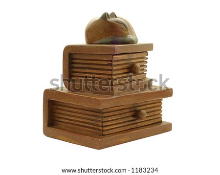 Wooden hand-carved cat asleep on hardback books, trinket/jewelry drawers/box.
