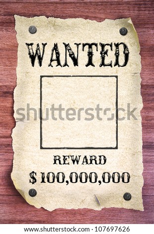 Wanted poster on wood background