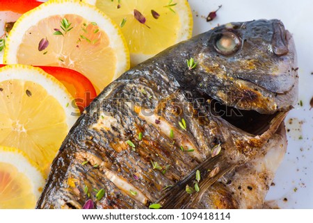 fish, sea bass grilled with lemon