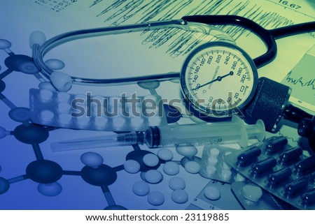 Tablets on a background of medical diagrams