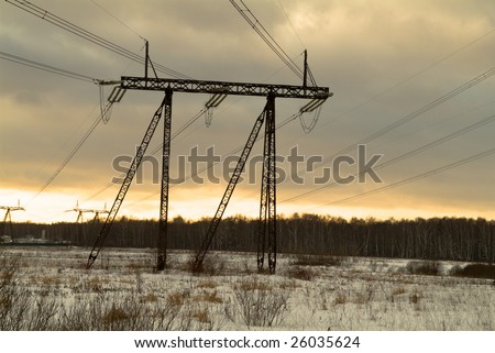 Winter snow landscape with electric lines
