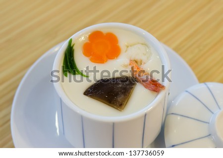 Chinese Steam egg with meat in white bowl