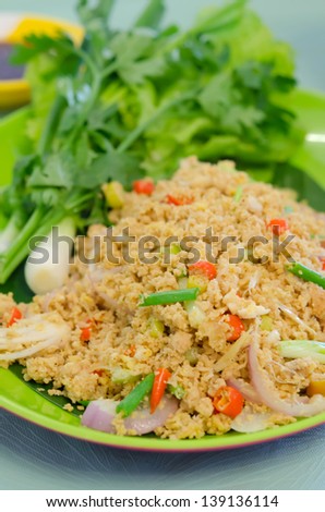 close up  fish roe with mix vegetable, served with fresh green vegetable , spicy and sour food