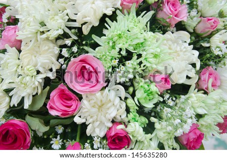 mixed of   flower  bouquet ,  fresh flora  and leaves