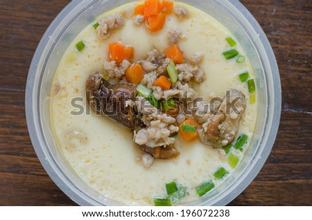 top view Chinese Steam egg with mushroom , minced pork and vegetable
