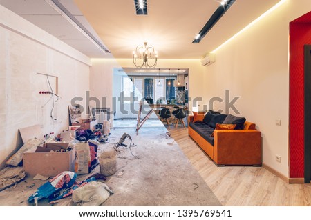 Modern interior design of big living-kitchen studio room, before and after Photo stock © 