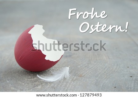 Easter card with red easter egg  and feather/easter/egg
