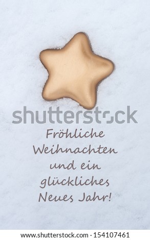 christmas card with golden star/Merry Christmas and a happy new year/german