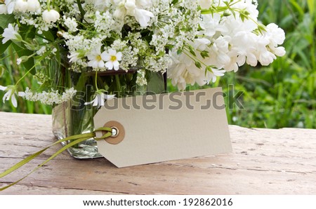 Lily of the valley, lilac, elder and label/flowers/Ma