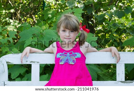 Young girl in the garden/girl/summer