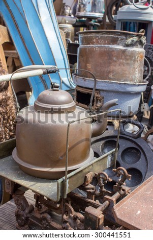 Flea market stand with scales and kettle / scale and kettle / Flea Market