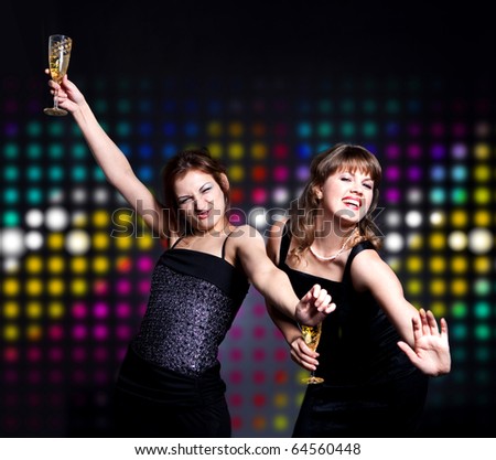 two women dancing on the disco party