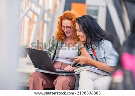 Similar – Image, Stock Photo Two young and casual women spending time together