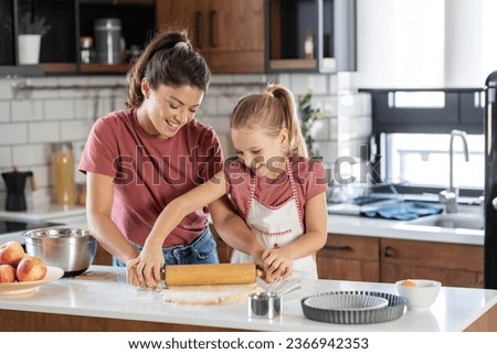 Similar – Image, Stock Photo Baking apple pie, recipe step by step. Making of an apple tart isolated on green background