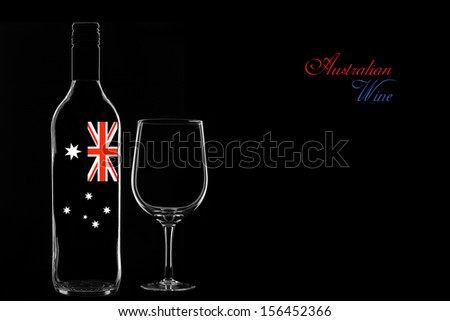 Low-key Studio Shot of a Wine Bottle and a Wine Glass on a Black Background.Australian Wine Concept