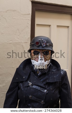 WHITBY, ENGLAND - April 25, 2015: Man in Goths Attire Participating at Whitby Gothic Weekend. Whitby Goth Weekend is a Twice-Yearly Music Festival for Goths, in Whitby, North Yorkshire, England