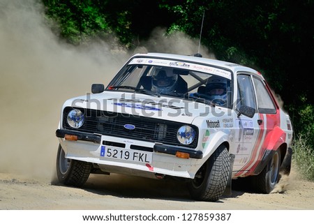 PLATJA D\'ARO, SPAIN - MAY 27 : Spanish driver Ferran Font and his codriver Oriol Julia in a Ford Escort RS MkII  race in the 2nd Rally Terres de Catalunya, on May 27, 2012 in Platja D\'Aro, Spain