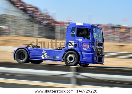 MADRID, SPAIN - OCT 10 : Spanish driver Javier Mariezkurrena in a MAN truck races in the XXIV GP of Spain during the the 2011 FIA Truck Racing season, on Oct 10, 2011 in Madrid, Spain.