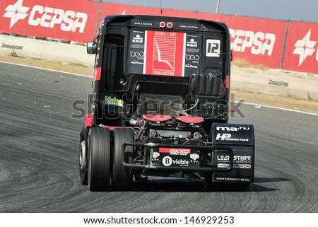 MADRID, SPAIN - OCT 10 : Hungarian driver Norbert Kiss in a MAN truck races in the XXIV GP of Spain during the the 2011 FIA Truck Racing season, on Oct 10, 2011 in Madrid, Spain.