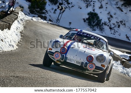 AVILA, SPAIN - MAR 1: Spanish driver Carlos De Miguel and his codriver Javier Arias in a Renault Alpine A110 races in the V Historic Rally of Spain , on Mar 1, 2013 in Avila, Spain.