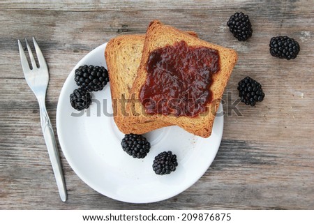 Toast with jam, Toast with berries jam on white plate