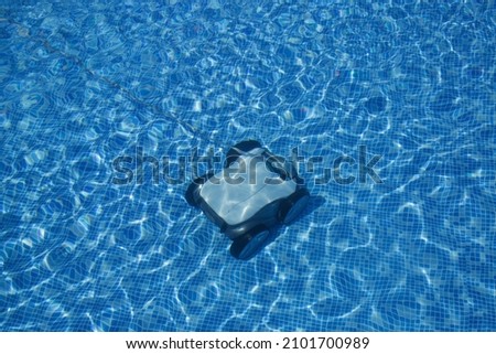 Similar – Image, Stock Photo Swimming pool cleaner robot during vacuum service, maintenance. Top view