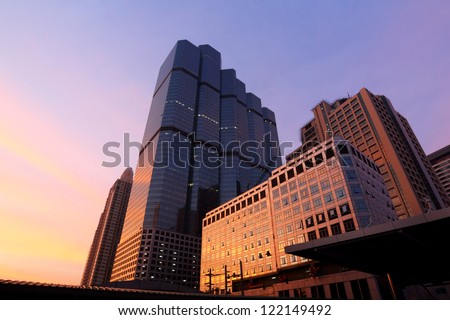 Sunrise over business area , buildings in the city of bangkok