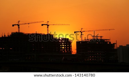 Construction Site silhouettes  with sunset background
