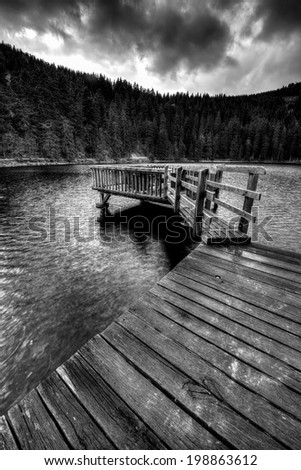 Pier and outdoor dining deck at Mummelsee Lake in the Black Forest, Germany