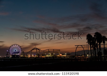 LOS ANGELES, USA - SEPTEMBER 22: Santa Monica Pier after sunset on September 22, 2012 in Los Angeles. Santa Monica Pier contains Pacific Park, an amusement park with a famous Ferris wheel.
