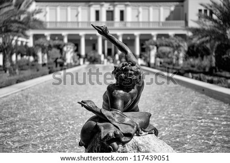 LOS ANGELES, USA - OCTOBER 4: Bacchus statue at the Getty Villa on October 4, 2009 in LA. The Getty Villa is a roman villa recreated after ancient blueprints of the Villa of the Papyri at Herculaneum.