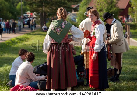 BINGSJO, SWEDEN - JULY 3: The traditional folk music festival on July 3, 2013 in Bingsjo. The festival is held annually on the first Wednesday in July and attracts thousands of musicians and visitors.