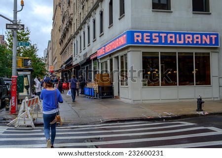 NEW YORK CITY, USA SEPTEMBER 25: Pedestrians pass Tom\'s Restaurant at 2880 Broadway on September 25, 2014 in NYC. This is the location for Suzanne Vegas Toms Diner and Seinfelds Monks Cafe.