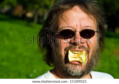 apple eating man