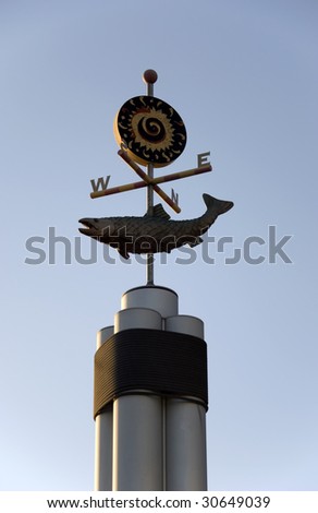 Decorative weather vane that marks the direction of the wind